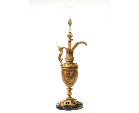 A GILT-METAL 'CELLINI STYLE' EWER MOUNTED AS A TABLE LAMP20th CenturyMounted on a marble base and fitted for electricity, wit