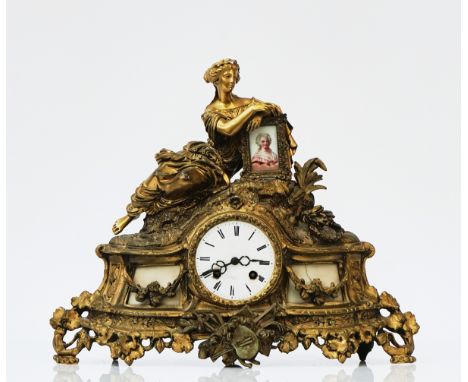 A FRENCH GILT-METAL AND MARBLE MOUNTED STRIKING MANTEL CLOCKBy Rollin, Paris, late 19th CenturyCase mounted with Classical fi