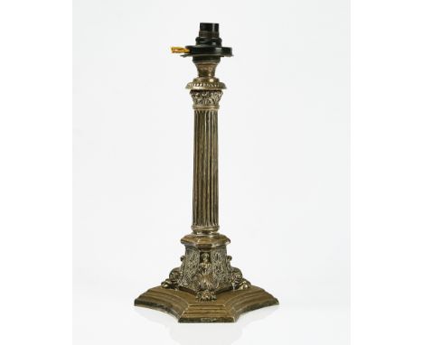 A silver table lampModelled as a classical column, raised on a triform base, by Walker &amp; Hall, Sheffield 1902, (loaded) h