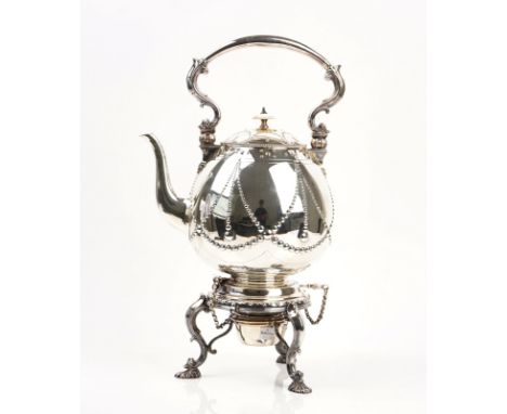 A silver plated spirit kettleThe kettle of ovoid form, having a swingover handle, raised on a tripod stand, fitted with a spi