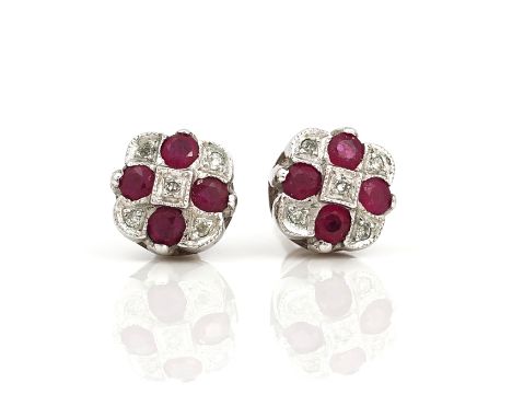 A pair of 9ct white gold, ruby and diamond cluster earstudsEach mounted with four circular cut rubies and with five circular 