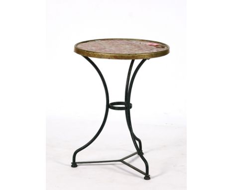 AN EARLY 20TH CENTURY FRENCH METAL MOUNTED RED MARBLE OCCASIONAL TABLEOn green painted iron tripod support, 55cm diameter;  7