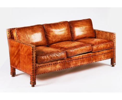 A MID-20TH CENTURY THREE-SEAT STUDDED BROWN LEATHER UPHOLSTERED SQUARE BACK SOFA203cm wide; 80cm highCondition report:&nbsp;I