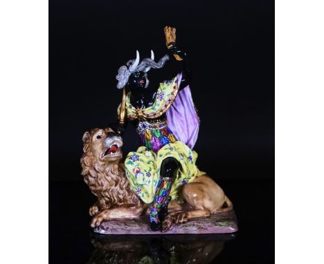 A large Meissen allegorical group of Africa19th centuryModelled as a female blackamoor wearing an elephant headdress, seated 