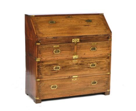 AN ANGLO-INDIAN BRASS BOUND TEAK CAMPAIGN BUREAUWith fitted interior, over four drawers, 104cm wide; 106cm highCondition repo