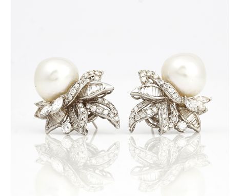 A pair of white gold, South Sea cultured pearl and diamond earclipsEach of foliate design, mounted with baguette, marquise an