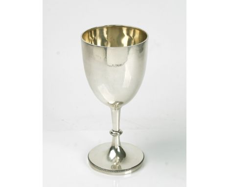 An Edwardian silver trophy gobletBy Holland, Aldwinckle &amp; Slater, London 1906The plain bowl raised on a circular pedestal