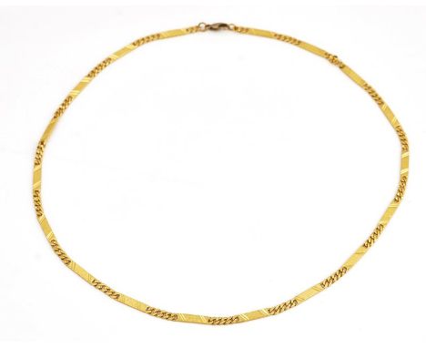 A gold necklaceIn a panel and faceted curb link design, with an associated sprung hook shaped clasp, length of necklace, incl