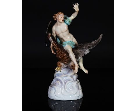 A Meissen group of Ganymede and the EagleLate 19th centuryRaised on a tall moulded cloud base, blue crossed swords mark, inci
