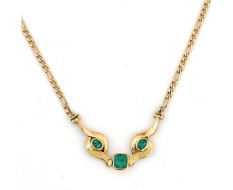 A gold and emerald necklaceThe front mounted with a cut cornered rectangular emerald, between two oval cut emeralds, detailed