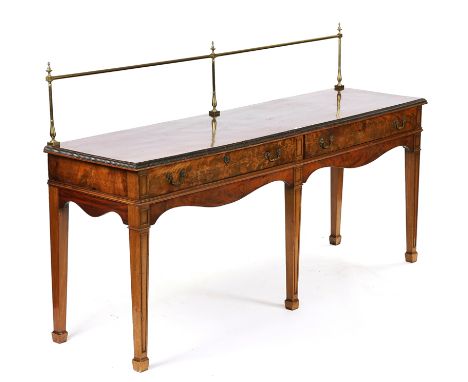 AN 18TH CENTURY STYLE MAHOGANY TWO DRAWER SERVING TABLEWith brass galleried back, 216cm wide; 57.5cm deep 125cm highCondition