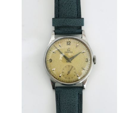 A stainless steel cased Omega wristwatchCirca 1950The cal.265 17 jewel movement detailed 'Omega', with a blue leather afterma