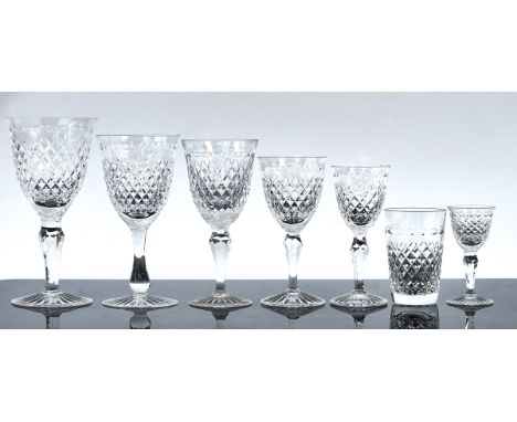 A composite Stuart crystal suite of drinking glassesComprising; one large wine glass, 18cm high, twelve red wine glasses, 16.