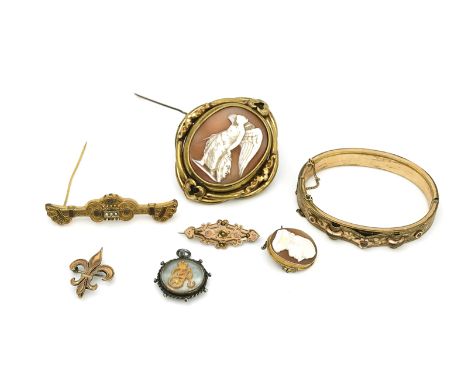 A collection of Victorian and later jewellery (7)Comprising a gilt metal oval hinged bangle, a gilt metal mounted shell cameo