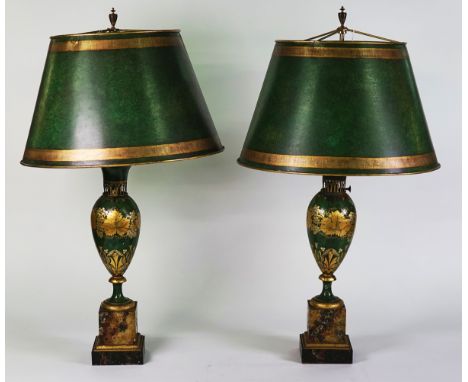 A PAIR OF GEORGE III STYLE PARCEL-GILT AND GREEN TOLE PEINTE TABLE LAMPSLate 20th CenturyMounted on painted faux marble squar