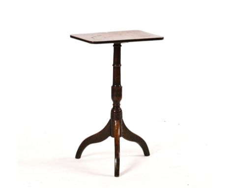 A LATE GEORGE III OAK TRIPOD TABLECirca 1800, 44cm wide; 72cm high