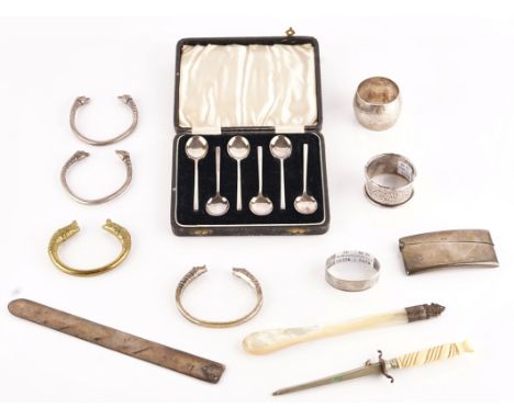 Six silver coffee spoons and further items (11)The coffee spoons Birmingham 1934, cased, three silver napkin rings and a silv