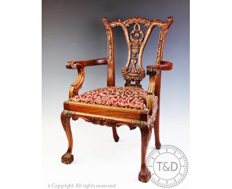 An early / mid 20th century apprentice piece dining chair, carved as a carver in the manner of Chippendale with upholstered s