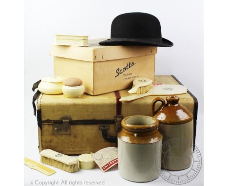 A vintage travelling trunk with Cunard line travel labels, 61cm wide, two Scotts &amp; Co bowler hats within original boxes, 