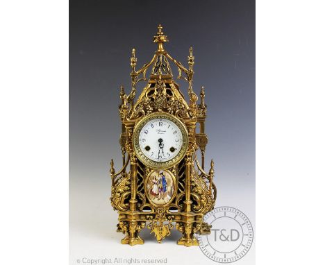 A modern German cast brass eight day mantel clock, with Arabic dial printed 'H Moser London', below a printed porcelain plaqu
