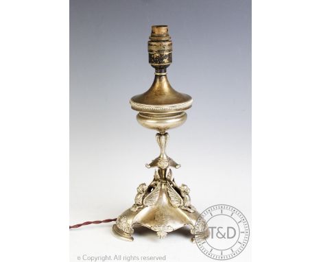 A Victorian silver table lamp, Frederick Elkington, Birmingham 1875, the trefoil base mounted with three winged mythological 