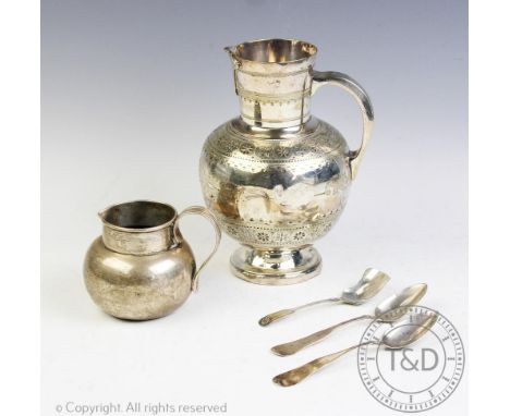 A Victorian silver milk jug, Birmingham 1896, with two American white metal spoons, one stamped 'Wm R Durgin', the other 'F&a