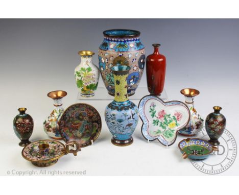 A collection of Japanese cloisonne items, c1900 and later, to include a pair of vases decorated with shaped panels of flowers