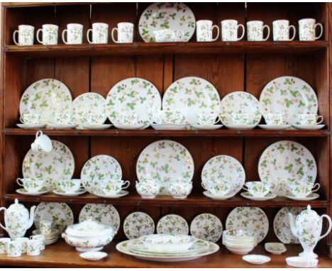 A Wedgwood Wild Strawberry pattern part dinner service, comprising: eight dinner plates, eight dessert plates, three side pla