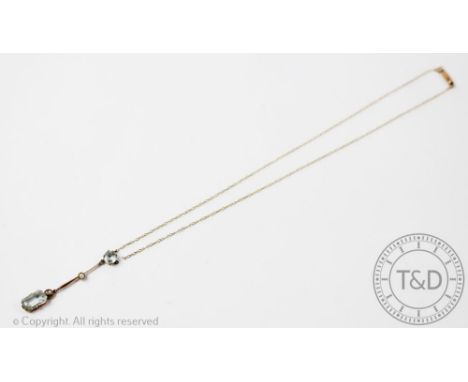 An aquamarine and seed pearl set necklace, early 20th century, designed as a canted rectangular drop suspended from a knife e