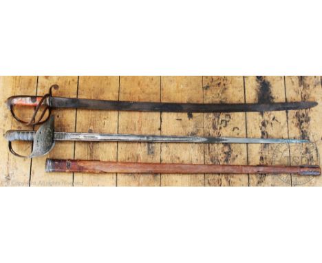 A George V officers sword, with 82cm Henry Wilkinson acid etched blade, and wire bound fish skin grip, with an officers saber