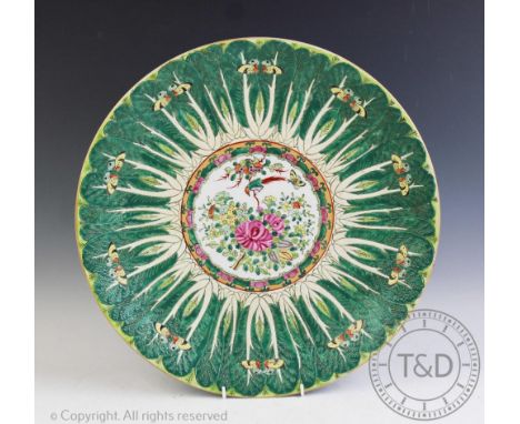 A Chinese porcelain famille rose charger, Yong Zhang seal mark, of cabbage leaf design and central decoration of floral and f