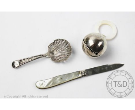 A selection of silver to include a William IV silver bladed and mother of pearl handled fruit knife, Nathaniel Creswick &amp;
