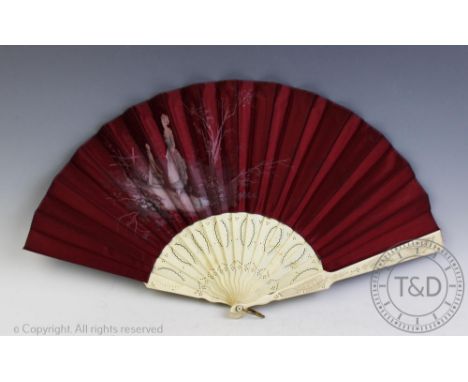 A late Victorian ladies bone fan, each carved bone guard and stick supporting a silk leaf mount printed with a scene of a wat