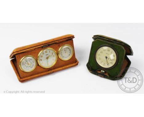 An Asprey silver plated eight day travelling time piece, in embossed green leather case, 10.5cm wide, with an Angelus travell
