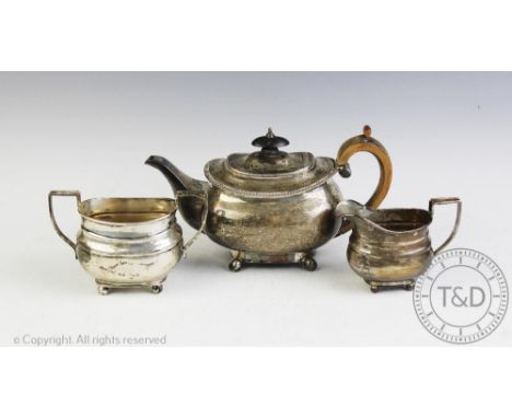 A George III silver teapot, marks worn, with a similar sugar bowl and jug, Sheffield 1936, 18.5ozt gross (3) CONDITION REPORT