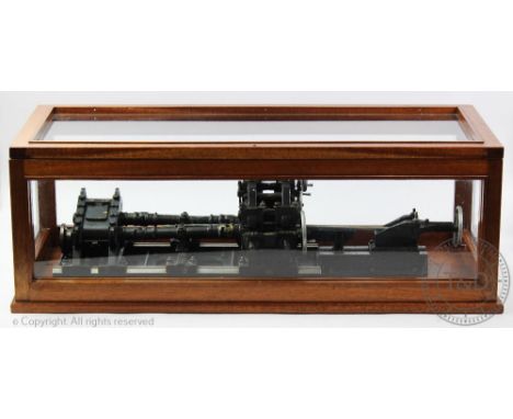 A scale model of a Mannasmen type three piercing mill, for piercing a hole in steel billets prior to rolling out a tube on a 