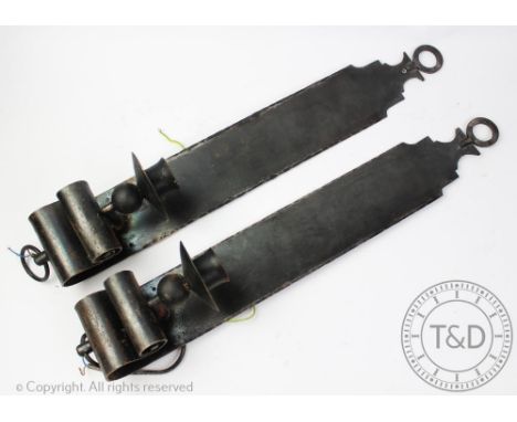 A pair of Arts &amp; Crafts style wrought iron wall sconces, each rectangular moulded back plate terminating with a scroll el