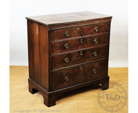 An 18th century and later oak chest, with two short and three graduated long drawers, on bracket feet, 90cm H x 86cm W x 47cm