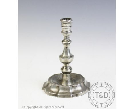 An 18th century pewter candlestick dated 1781, 18cm high