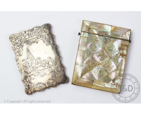 A Victorian silver calling card case, Alfred Taylor, Birmingham 1855, of shaped, rectangular design and finely chased with a 