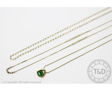 A 'Jade' set pendant within yellow metal, setting stamped '750' and an attached fine snake chain stamped '14k', gross weight 