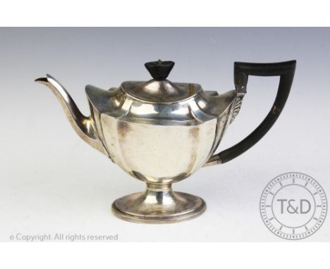 An assembled silver three piece tea service, comprising teapot and sugar bowl, Thomas Bradbury &amp; Sons, London 1894, and a