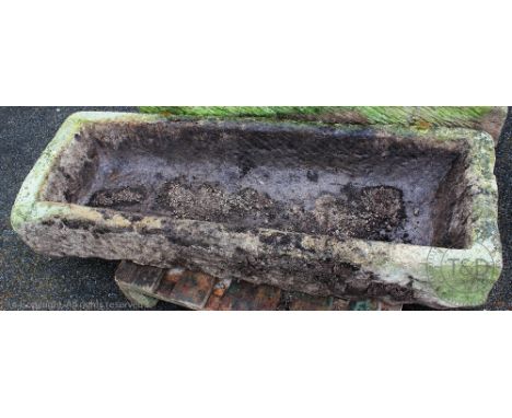 A 19th century sandstone garden trough, 22cm H x 128cm W x 45cm D CONDITION REPORT: The internal size is 13cm high x 114cm wi