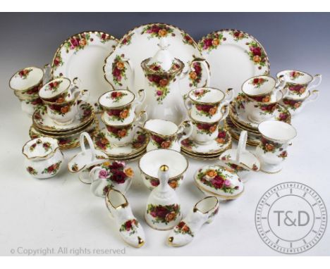 A Royal Albert Old Country Roses part tea and coffee service, comprising; three six tea cups and saucers, six coffee cups and