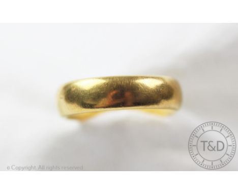 A 22ct yellow gold wedding band, size K/L, gross weight 8.48gms 