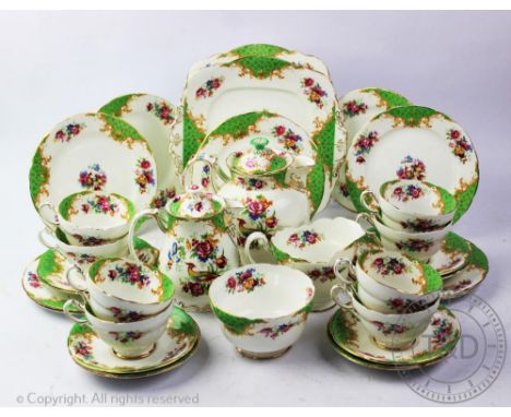 A Paragon Rockingham pattern thirty piece part tea service, (one lid repaired) (30) CONDITION REPORT: One of the saucers with