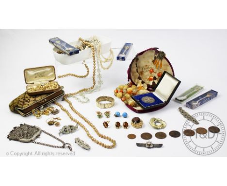 A selection of costume jewellery, to include; Art Deco bead necklaces, an Odeonesque amethyst coloured necklace, a rock cryst