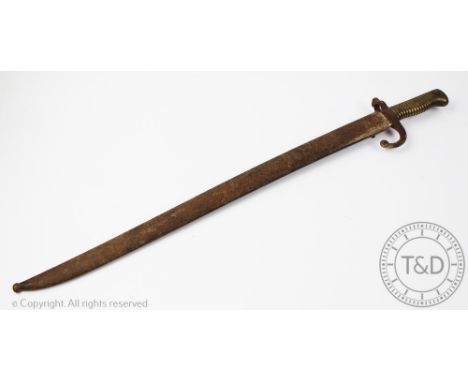 A French 'St Etienne' bayonet and scabbard, the blade back inscribed and dated 1869, 70cm CONDITION REPORT: The number on the