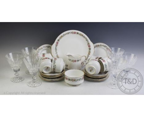 A Paragon 'Belinda' pattern tea service for six, comprising; six teacups and saucers, six cake plates, a sugar bowl, a cream 