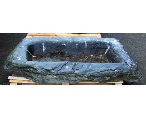 A 19th century rustic slate garden trough, 19cm H x 147cm W x 80cm D